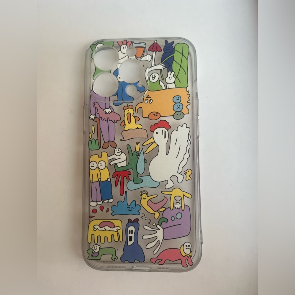 Multi colored iPhone 13 Pro case with cartoons
